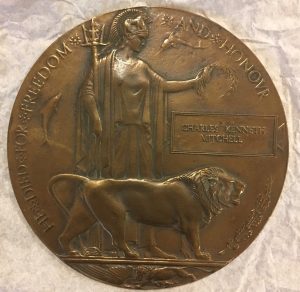 Bronze plaque inscribed with Charles Kenneth Mitchell