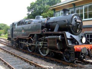 Dark green locomotive with number 80151 on front.