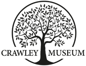 Crawley Museum logo - black tree with words 'Crawley Museum' across it.