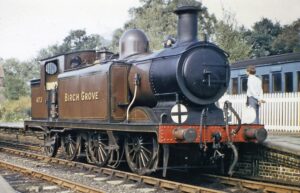 Brown locomotive. writing on side reads: 473. Birch Grove.