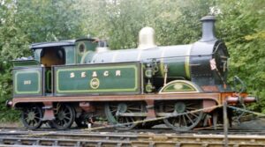 Green locomotive. Number on side - 253. Words on side - S E and C R