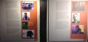 Display board with images and text about 'Characters of Crawley'. These are: Ron Shaw, Romesh Ranganathan, Gareth Southgate, Stuart Harold, John George Haigh, Alfred Morris Jackaman, The Cure.