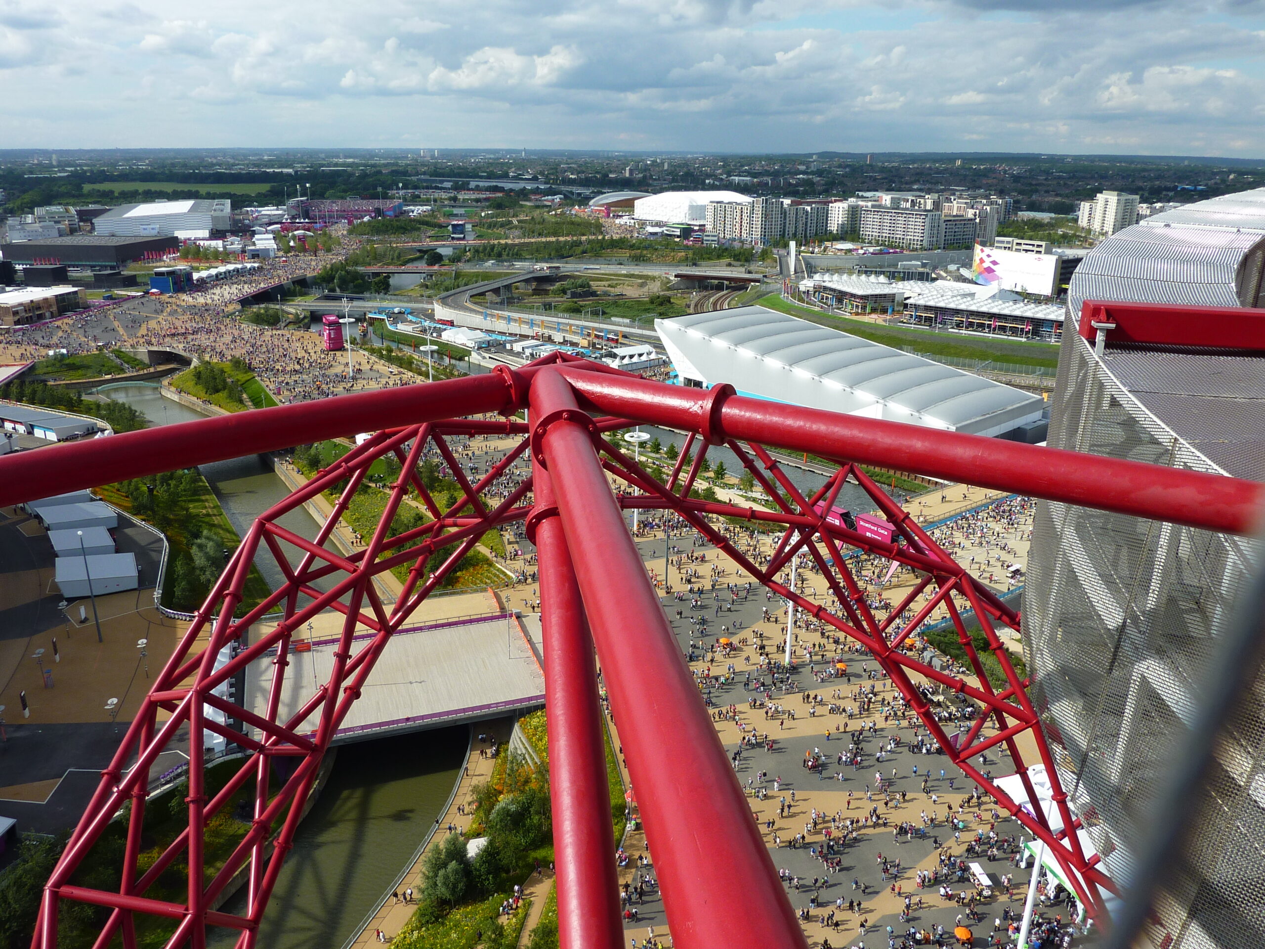 Arial view of London, with red framing in the foreground. 